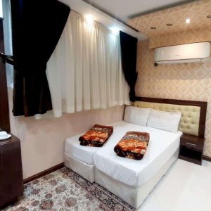 خانه مسافر مدینه النور مشهد اتاق سه تخته 1